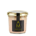 A 100g Spanish jar of ArteMonte Partridge páté with a gold lid with the Spainsh word Perdiz on the label on a white background