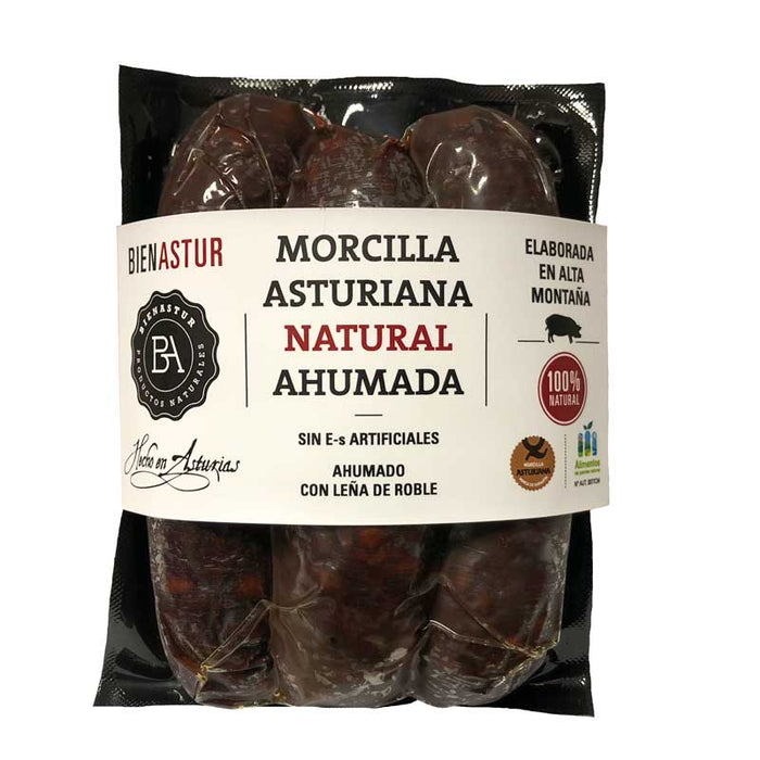 Packaged Bienastur Asturian morcilla sausage, three pieces visible through the transparent section of the black wrapping, with product information and branding visible on the label.