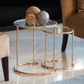 Danya B Set of Two Nested Round Side Tables in Gold with Clear Glass main image.