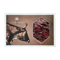 A 100g pack of Entrepenas Sliced Cecina Leon with a cow illustration on the pack