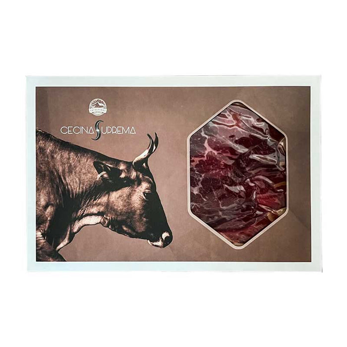 A 100g pack of Entrepenas Sliced Cecina Leon with a cow illustration on the pack