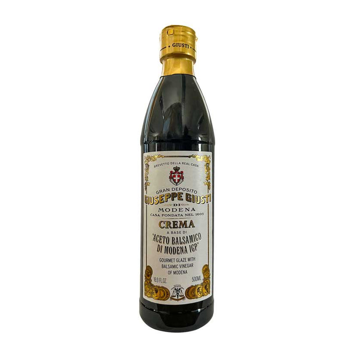 A 500ml bottle of Giuseppe Giusti Balsamic Glaze with a gold top on a white background.