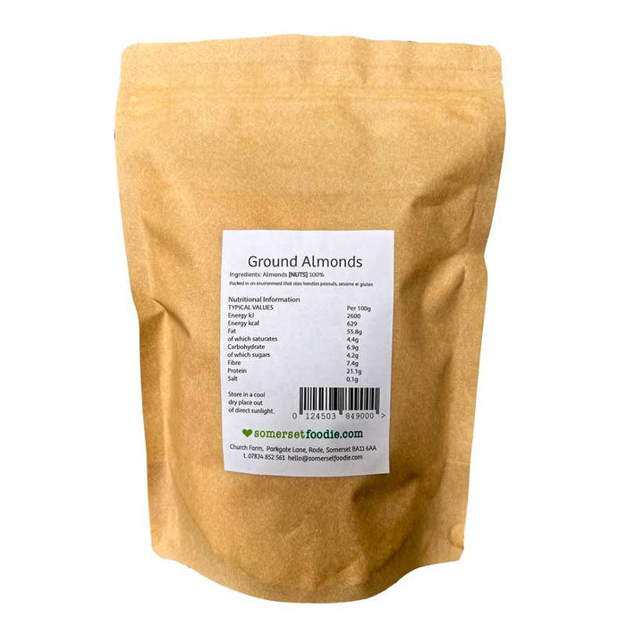 The reverse side of a Somerset Foodie pouch of Ground Almonds packed in a brown Kraft bag with a label on a white background