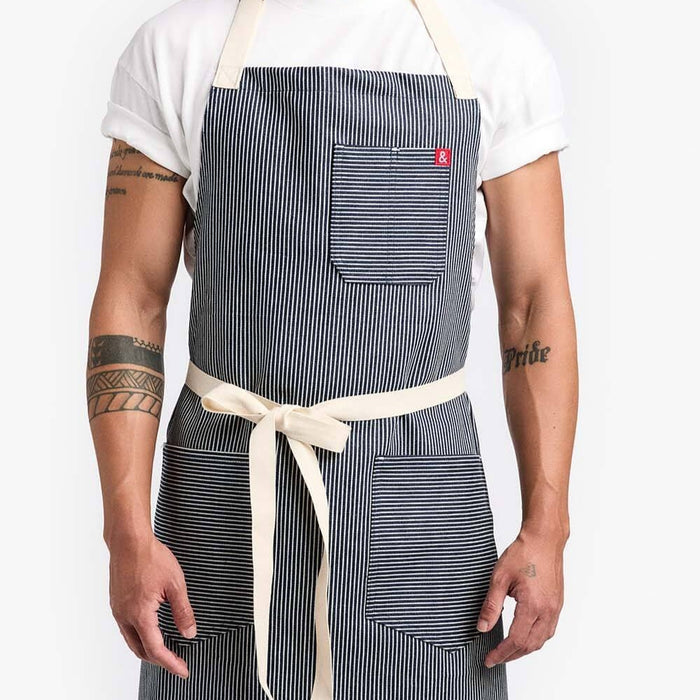 Man wearing Hedley & Bennett Hickory Striped Apron front