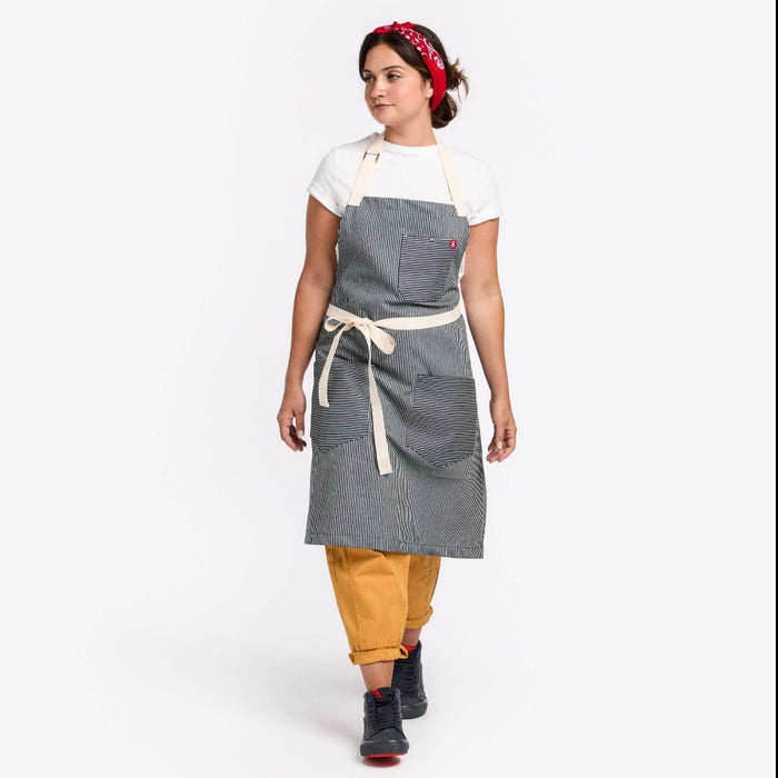 Young woman wearing Hedley & Bennett Hickory Striped Apron