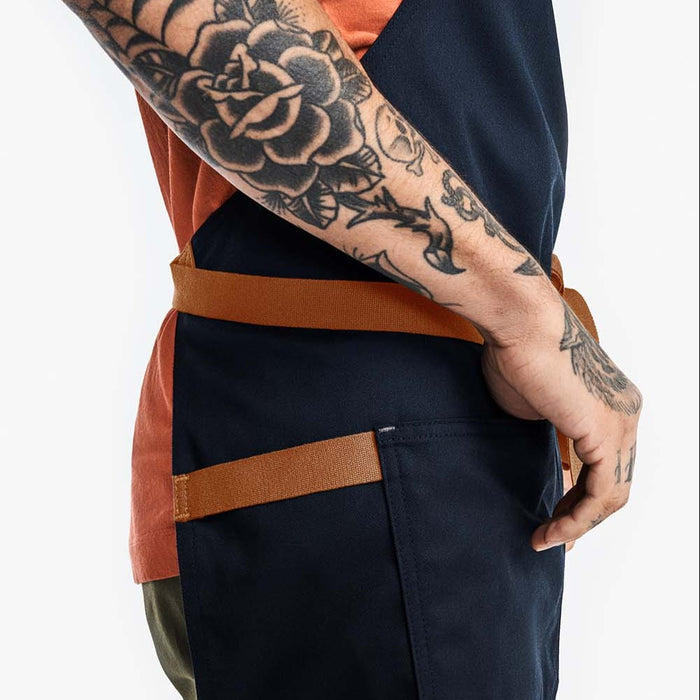 Man wearing Hedley & Bennett Midnight Essential Apron side view