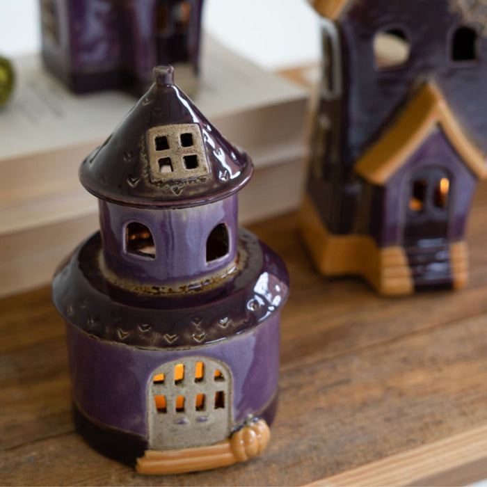 Close up of small ceramic halloween building.