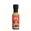 A 125ml bottle of hot La Chipotlera Llorona Salsa featuring a colourful, surrel image of a lady with flowers in her hair