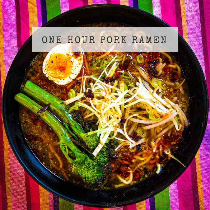 Recipe for One Hour Pork Ramen showing a black bowl with broth, egg, broccoli and noodles.