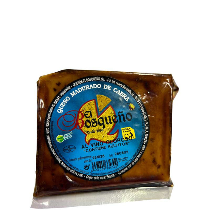 A portioned piece of El Bosqueño Payoya's Goats Cheese with Olorosso Sherry on a white background