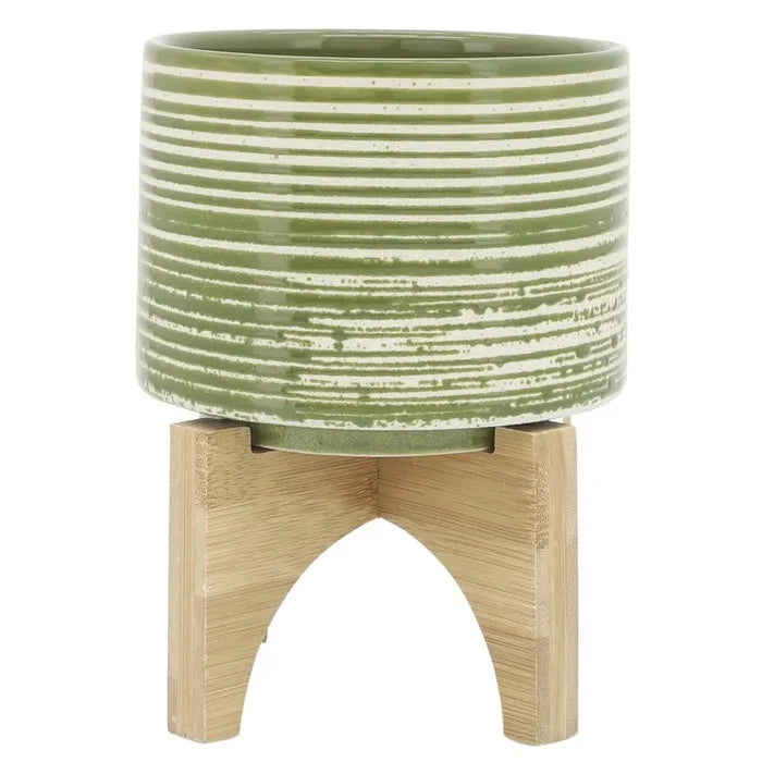 Sagebrook Home Ceramic 5 in. Planter On Wooden Stand in Olive main image.