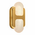 Side view of an H-shaped solid brass wall sconce with Spanish alabaster shade on white background