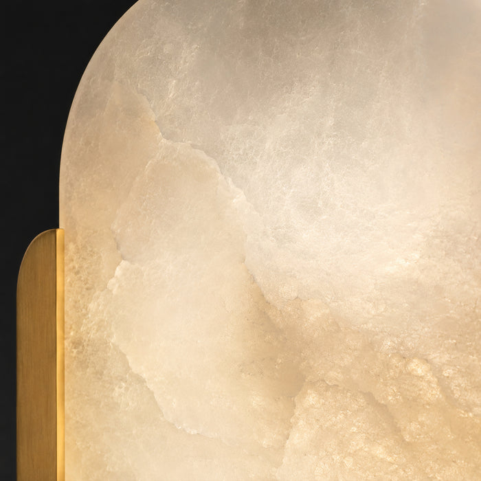 Close up detail of illuminated Spanish natural alabaster stone shade showing delicate veins and cloudy translucent texture