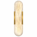 Illuminated long capsule Spanish natural alabaster wall sconce with brushed solid brass brackets on white background