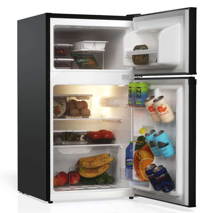 TCL 18 in. 3.1 Cu. Ft. Compact Top Freezer Mini Fridge in Black (TRM31D4AB) side, open, with food and drinks inside.