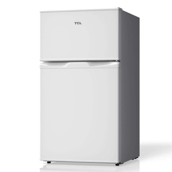 TCL 18 in. 3.1 Cu. Ft. Compact Top Freezer Mini Fridge in White (TRM31D4AW) angled.